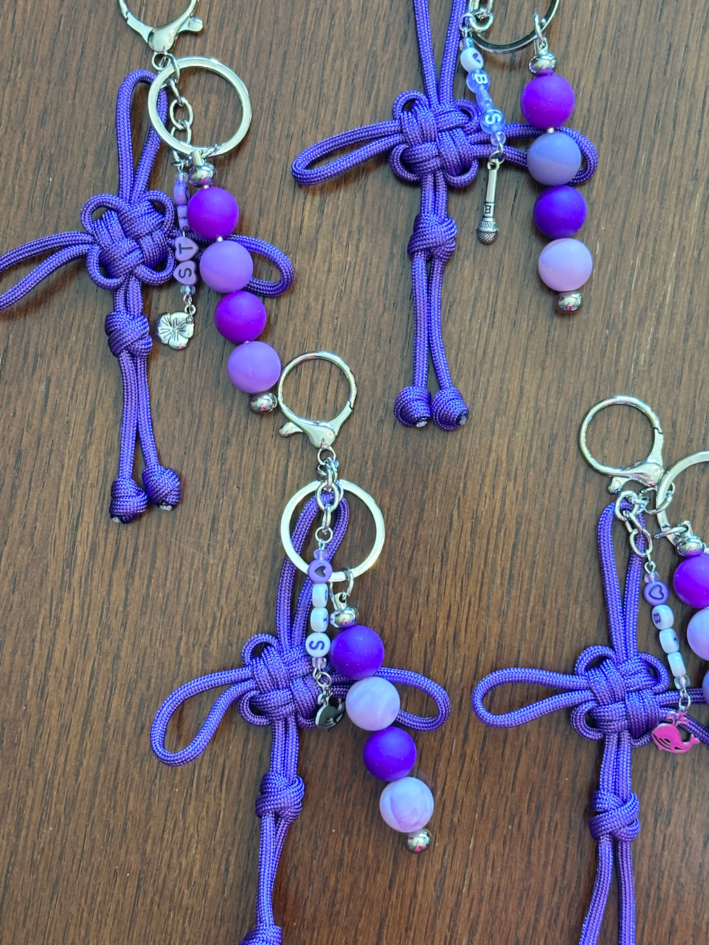 Dongsimgyol Knot, featuring stacked silicon beads - your choice of 'BTS" or Bias - RM, Jin, Suga, J-Hope, Jimin, V, JK. Along with your choice of charm - please see variances for choices.