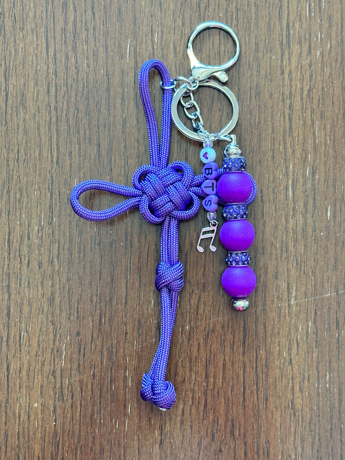 Dongsimgyol Knot, featuring beaded spacers - your choice of 'BTS" or Bias - RM, Jin, Suga, J-Hope, Jimin, V, JK. Music notes charm featured here, as one of your charm choices.